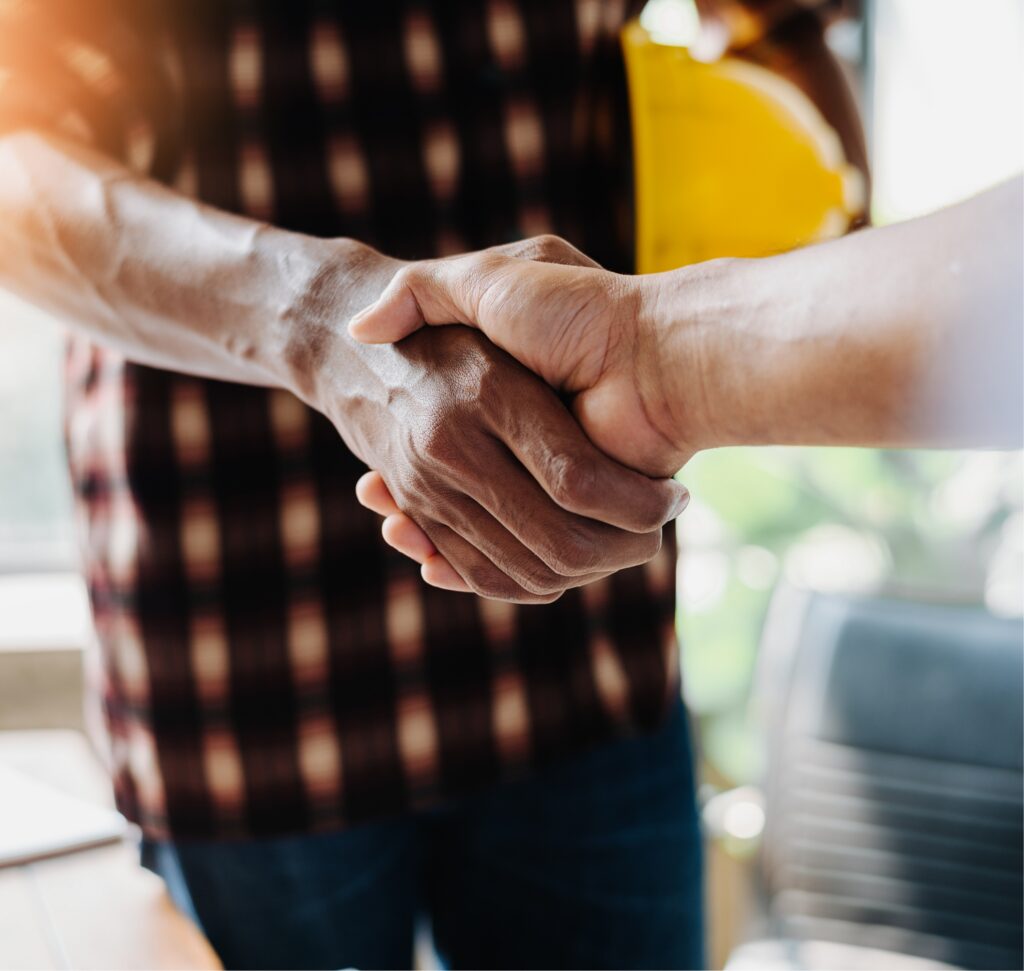 2 people shaking hands