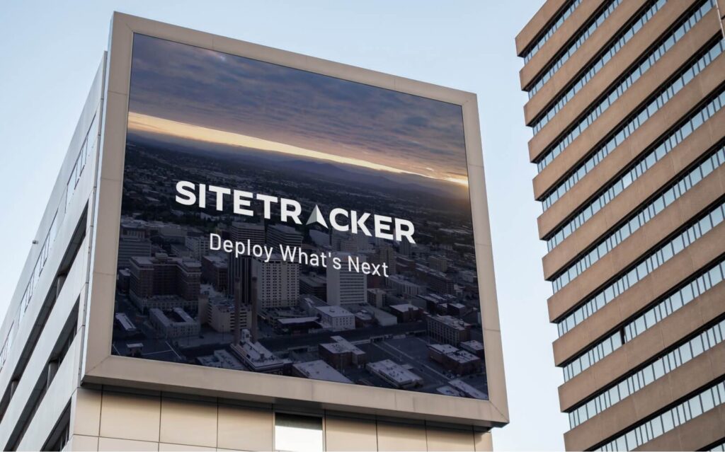 A large billboard on the side of a building advertising Sitetracker