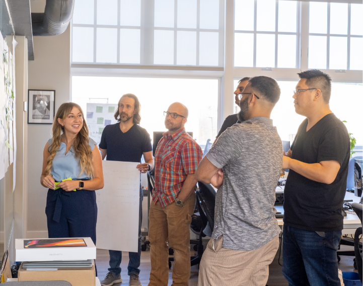 A group of professionals collaborating in an office