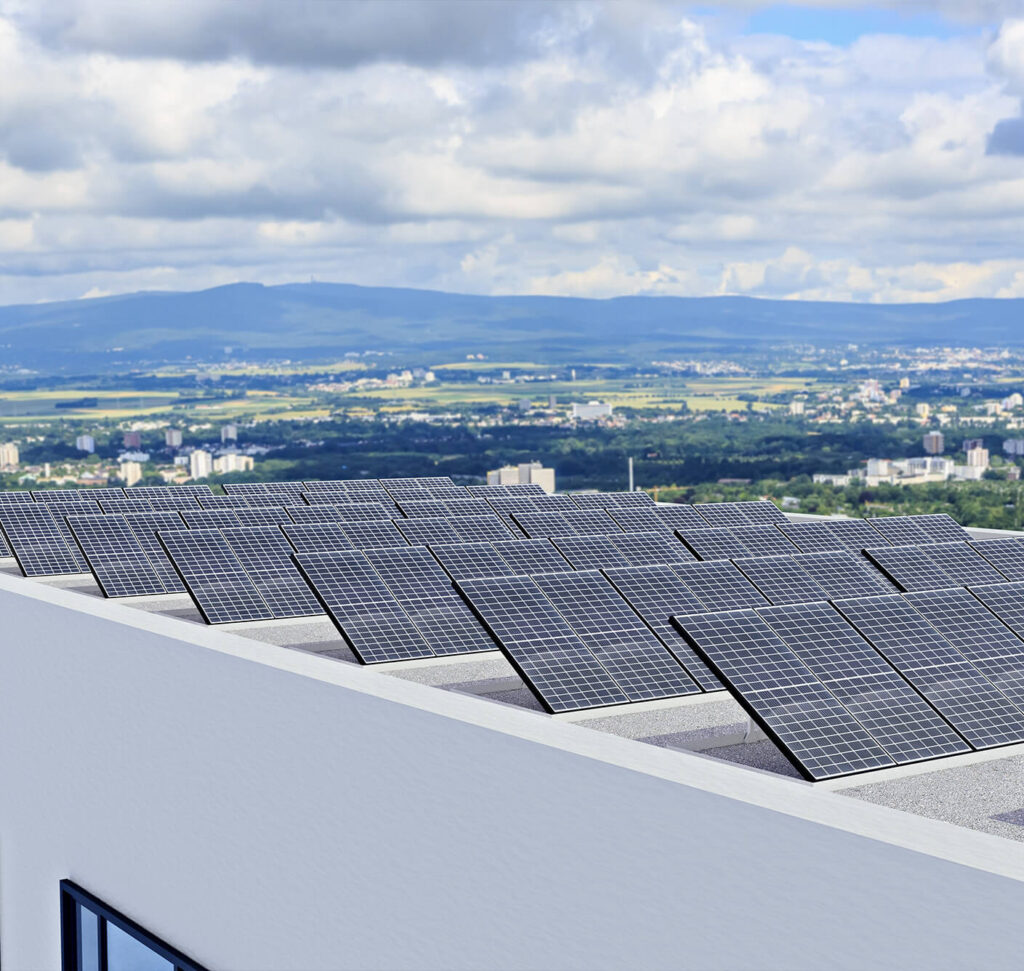 Rows of solar panels on the rooftop of a building