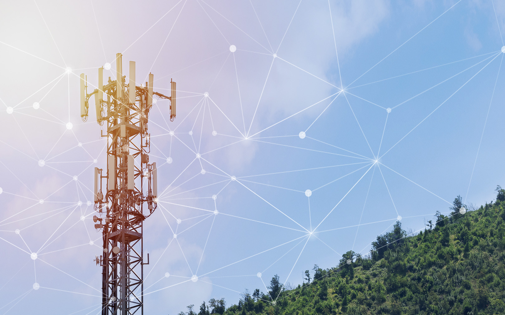 A cell tower on a green hillside with digital network connectivity lines illustrated against a clear blue sky