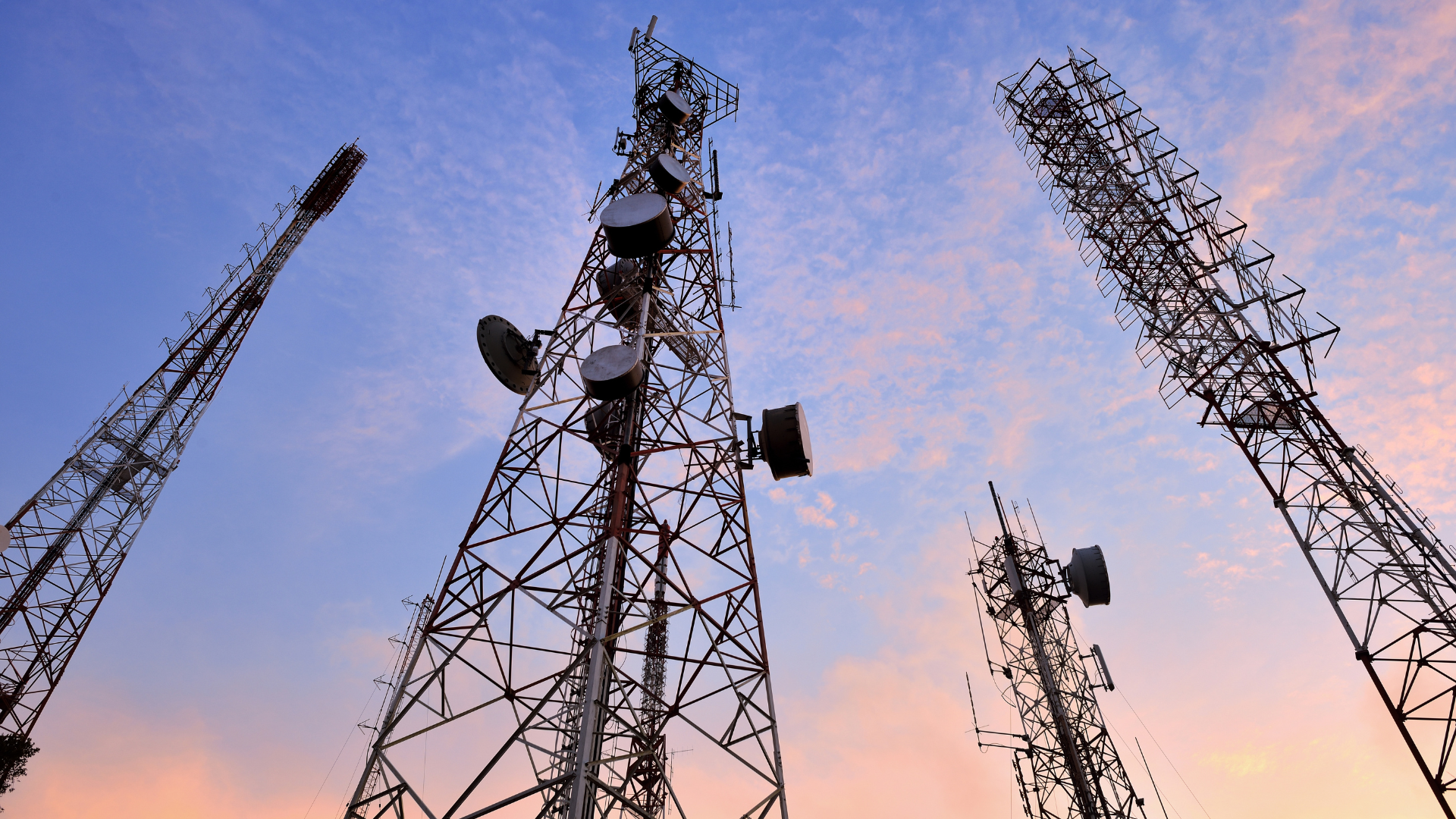 Telecommunications towers at sunset