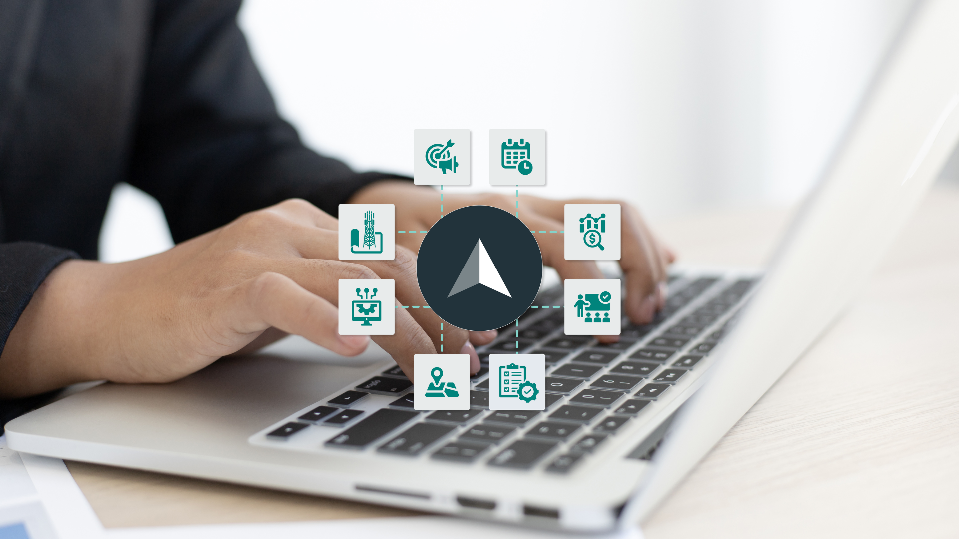 Hands typing on a laptop computer with a graphic of the Sitetracker logo integrating with other smaller icons